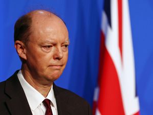 Supporting image for story: ‘Huge spike’ in Omicron cases risks overwhelming NHS, ministers warn