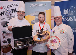 Dion Wyn Jones with Culinary Association of Wales president Arwyn Watkins, OBE (left) and chairman of judges Colin Gray