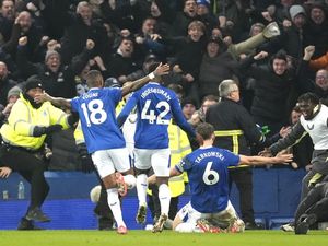 James Tarkowski slides on his knees to celebrate his goal