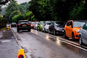 Crowds arrive at a damp V Festival this morning