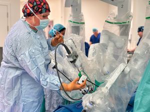 The team performed five robotic-assisted surgeries in one day.