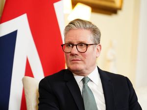 Keir Starmer in front of a Union flag