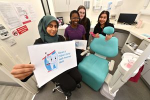Pictured are dentists:  Daniella Holder (in purple), and Sabriya Gatrad (in the head scarf), and receptionists:  Lucy Fletcher and Kavita Masih.