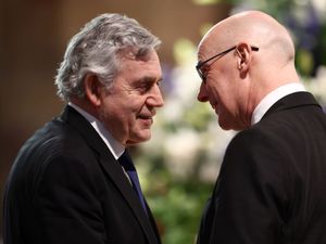 Former prime minister Gordon Brown (left) and Scottish First Minister John Swinney