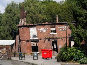 Supporting image for story: Man and woman arrested in connection with suspected Crooked House arson