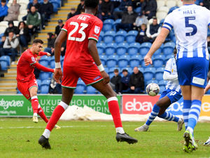 Taylor Allen scores for the Saddlers against Colchester United in 2024.