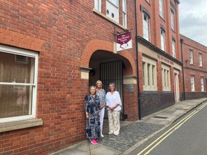 Pauline Briand, Libby Cooper and Jenny Taylor outside the Roy Fletcher Centre.