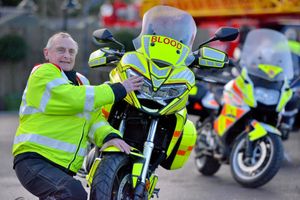 Volunteer blood bike rider Hugh Jackson, from Wrexham, with the bike named Chloe Lou