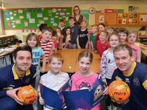 Supporting image for story: Shrewsbury Town pair in a class of their own with pupils