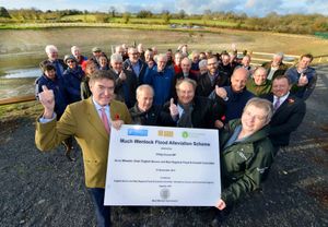 With Philip Dunne MP unveiling the plaque is Anne Wheeler, Chair English Severn and Wye Regional Flood & Coastal Committee, Cllr Peter Nutting (Shropshire Council leader) and local Cllr David Turner