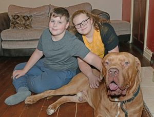 Jordan with sister Keira and dog Ozzy