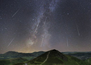 A composite image of the Perseid meteor shower by renowned space artist David A Hardy