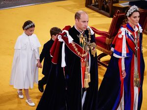 Supporting image for story: Prince Louis and Princess Charlotte hold hands during abbey arrival