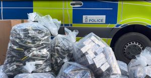 An estimated half a million pounds of counterfeit cigarettes and tobacco were seized during a raid on shipping containers in Kidderminster