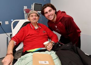 Walsall FC players visit Walsall Manor Hospital.Mason Hancock with patient John Hannon.