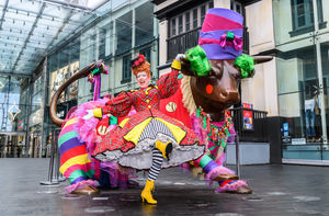 Panto Dame Andrew Ryan meets the Bull outside the Bullring in Birmingham City Centre.