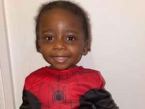 Supporting image for story: First picture of ‘cheeky’ two-year-old who fell into river is released