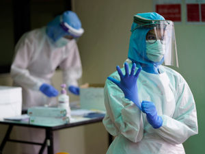 Supporting image for story: Glasses cleaner solution donated to help health staff using PPE