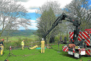 A crane is used in the rescue operation 