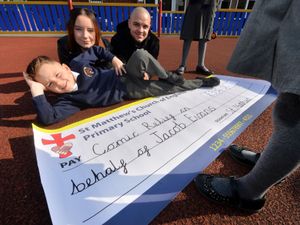 Supporting image for story: Schoolboy walks the extra mile to help charity