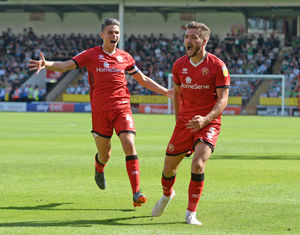Luke Leahy scores and celebrates his goal.