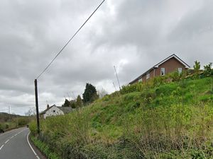 Supporting image for story: Council told to pay up after issuing 'invalid' enforcement notice to couple who 'remodelled hillside' without consent