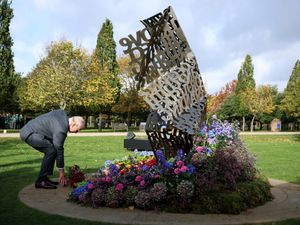 Supporting image for story: Charles lays flowers at first national LGBT armed forces memorial