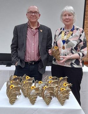 Kevin Reynolds and Anne Bumford with willow bird feeders