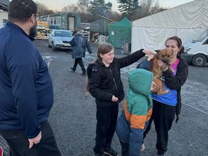 Supporting image for story: Tears of joy for family as they are reunited with dog that got lost at steam railway site