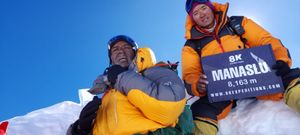 Wes 'enjoying' the cold, thin air, on top of Manaslu