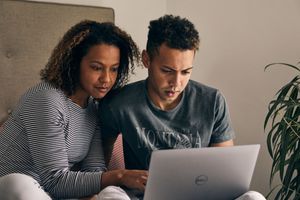 Mother and son exploring Sue Ryder's Online Bereavement Community