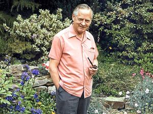 Percy Thrower in The Dingle, surrounded by his passion in life – plants
