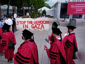 Supporting image for story: Group of graduates walk out of Harvard ceremony chanting ‘Free, free Palestine’