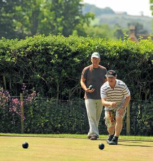 Bowling is Ian Gibson, watched by Tony Swales
