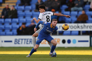 Carl Winchester of Shrewsbury Town and Alex Robertson of Portsmouth (AMA)