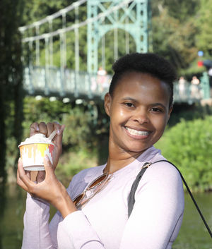 Mercy Nyamwaro, from Shrewsbury, enjoying an ice cream in The Quarry. Photo: Phil Blagg Photography. 