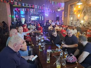 Out socialising with fans in the bars.