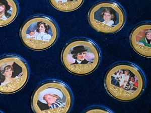 Supporting image for story: Life and times of the Queen shown in coin display