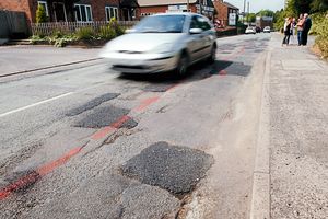 Potholes on the road