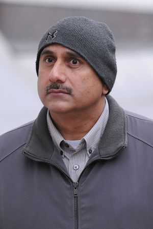 Pervez Akhtar drove off with the so-called Paedophile Hunter clinging to the windscreen of his car after he had turned up hoping to meet an under-age girl.