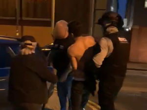 Supporting image for story: Alleged Vietnamese people smuggler charged after early-hours raid