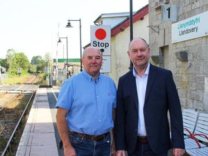 Mid West Wales Senedd Member Cefn Campbell (right) at Llandovery station
