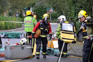 Emergency crews at the scene of the acid spill