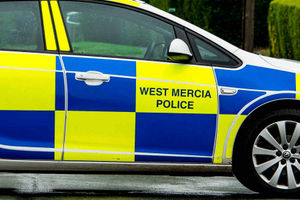 Supporting image for story: Van rolls on its side in crash