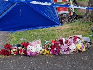 Over 20 bouquets of flowers have been left at the scene