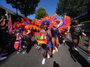 Supporting image for story: Colourful costumes and music fill streets for Notting Hill Carnival