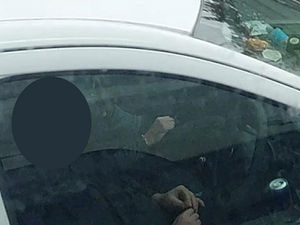 Supporting image for story: Driver caught 'rolling joint' behind the wheel on M6, almost 200 stolen cars recovered and £11.9m of drugs seized in police crackdown