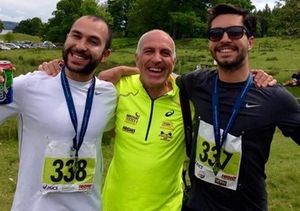 Matt Campbell right, with his father and brother completing the Brathay marathon