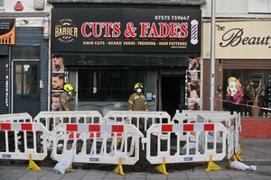 Fire crews outside Cuts and Fades on Saturday 