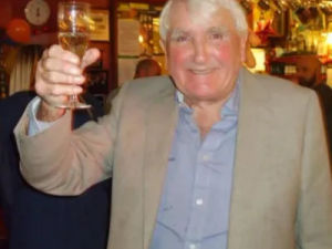 Supporting image for story: Man who put Welsh town on map with Man v Horse and bog snorkelling dies aged 90
